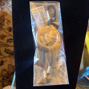 Michael Kors Gold MK Logo Phone Charm with Black Cord